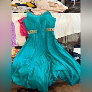 Elegant Teal Sleeveless Dress (churidar) with Gold Accents